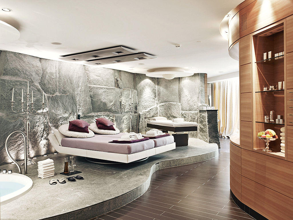 Massage chairs in stone room. 