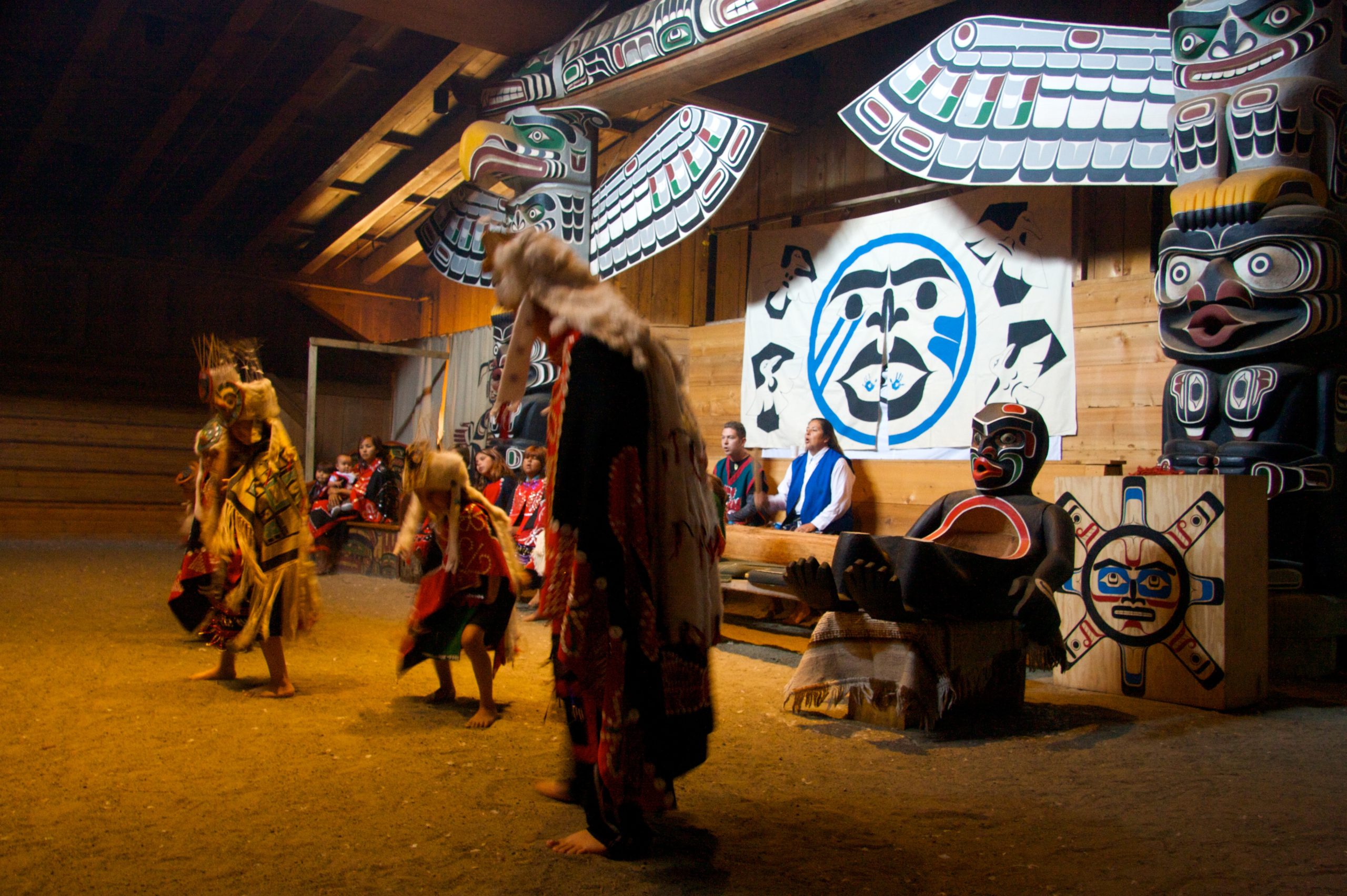 T'sasa-a Dancers inside Big House at Alert Bay, B.C.