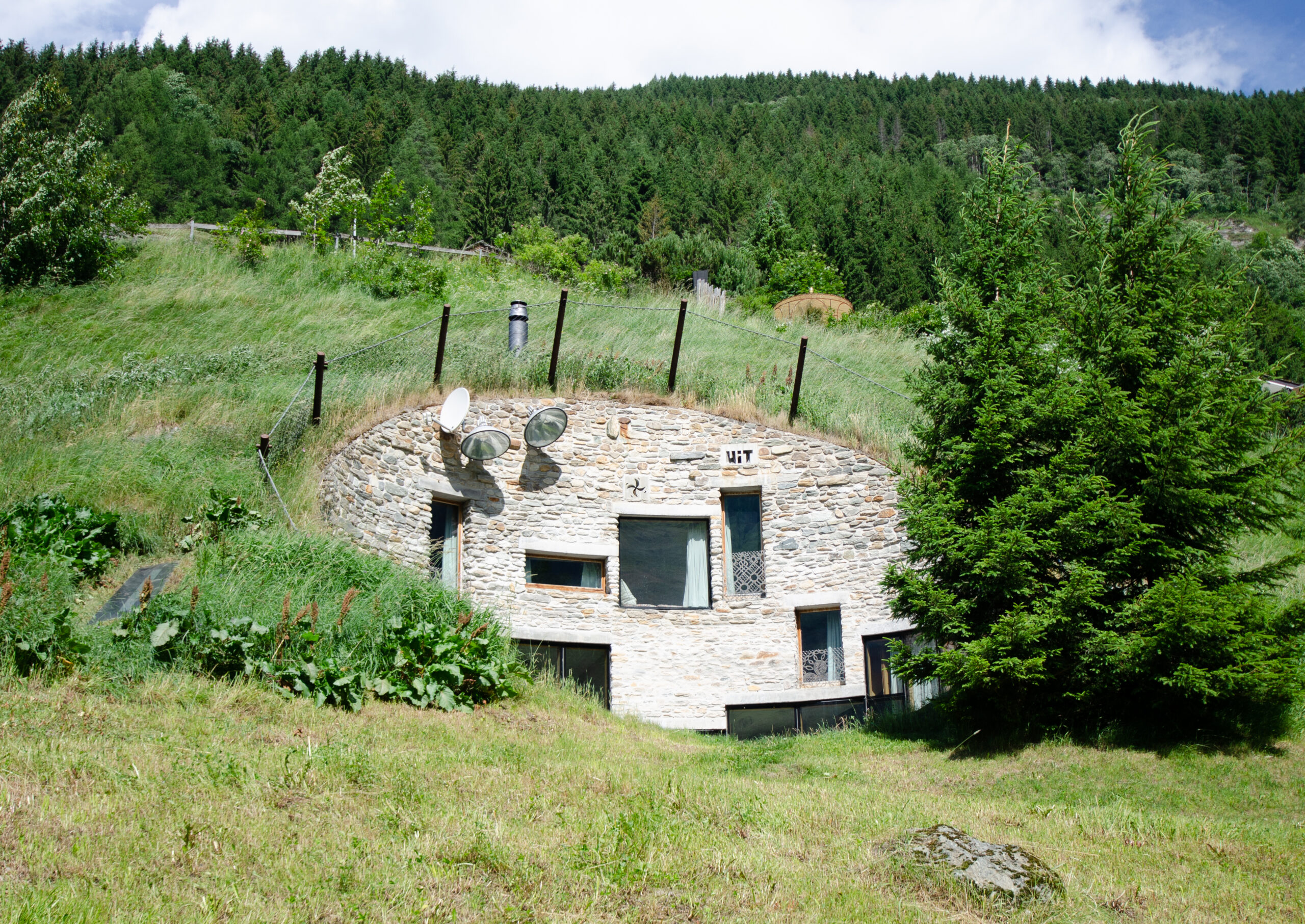 Stay in This Modern Hobbit Home in a Swiss Hillside | NUVO