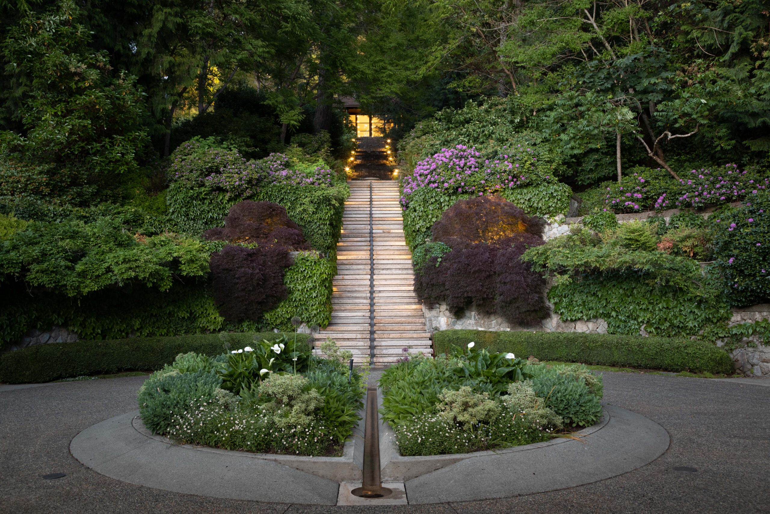 Victoria BC mansion steps through grass. 