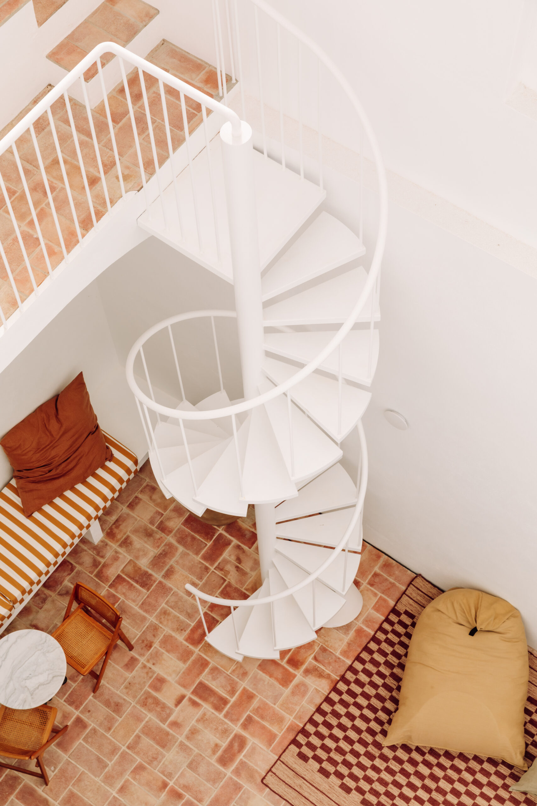 outdoor white metal spiral staircase