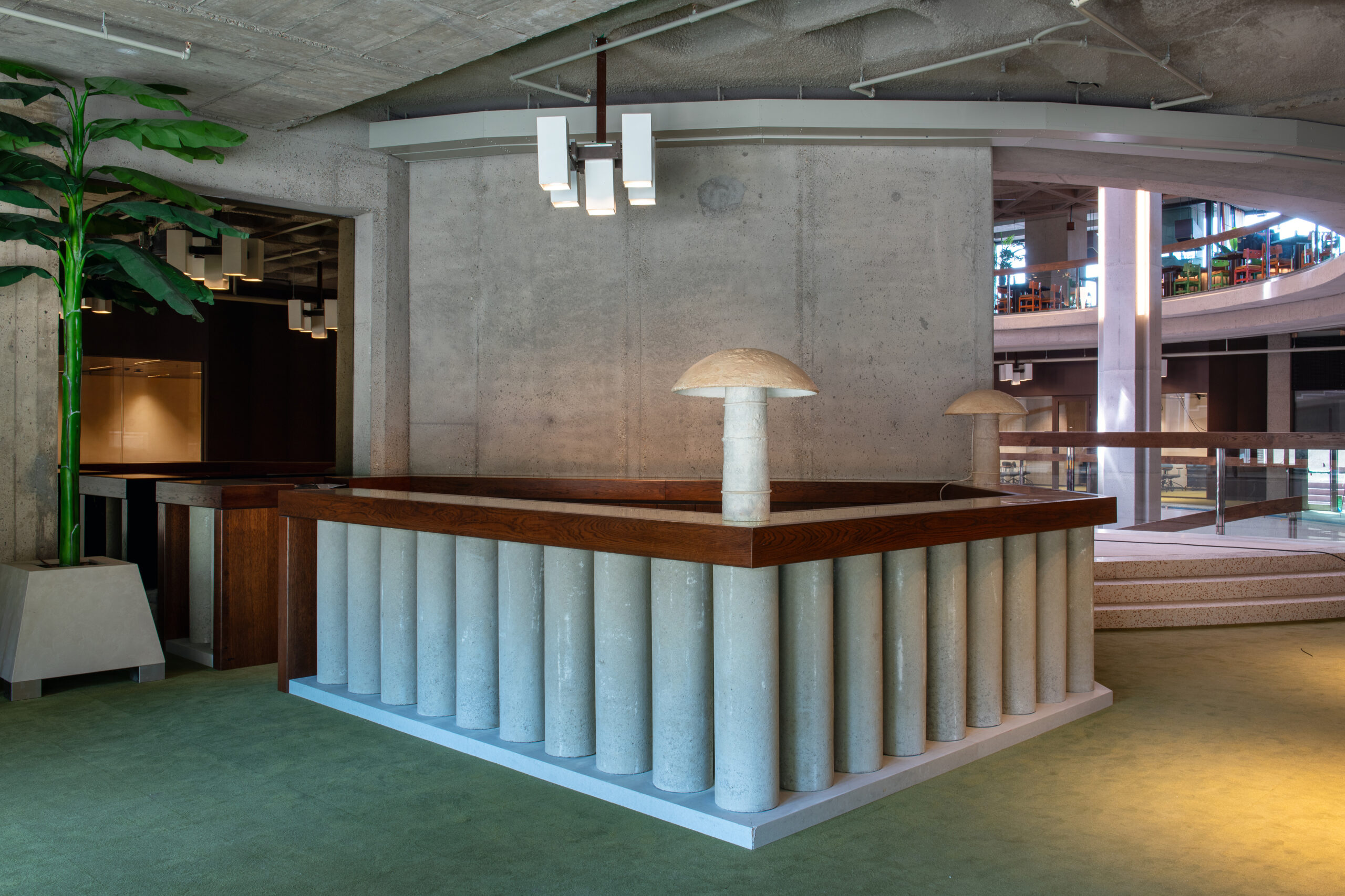 MIX by Brussels Artist Lionel Jadot hotel concrete desk with lamp