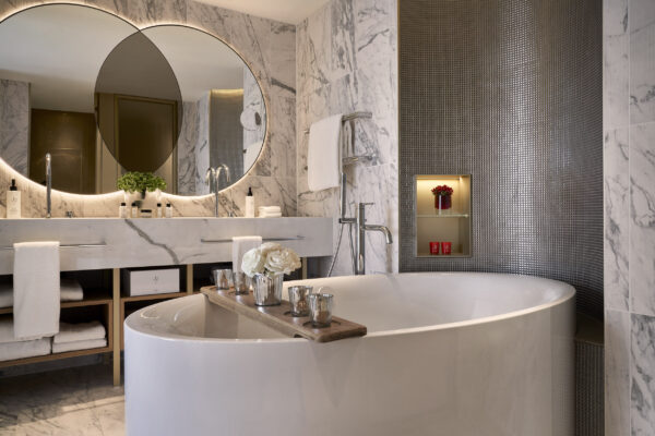 hotel suite bathroom bathtub and mirror