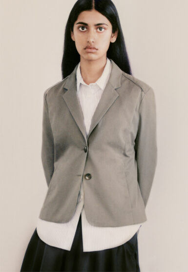 Wanze Song female model portrait wearing grey blazer