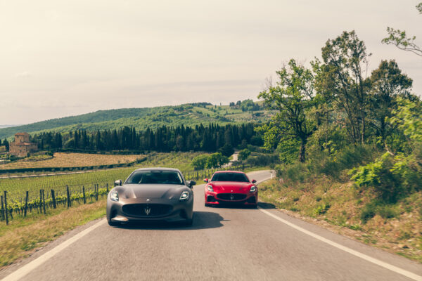 Maserati cars driving through Italy 