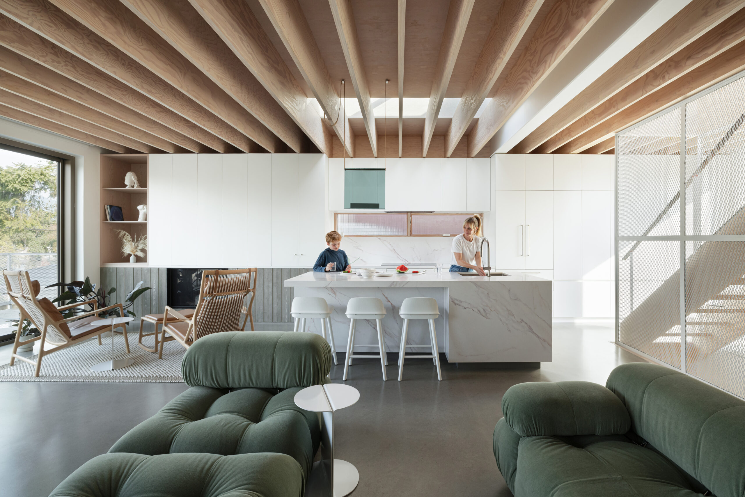 East Van Residence family in living room kitchen