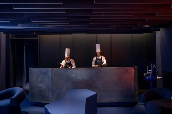 two chefs cooking in agli amici