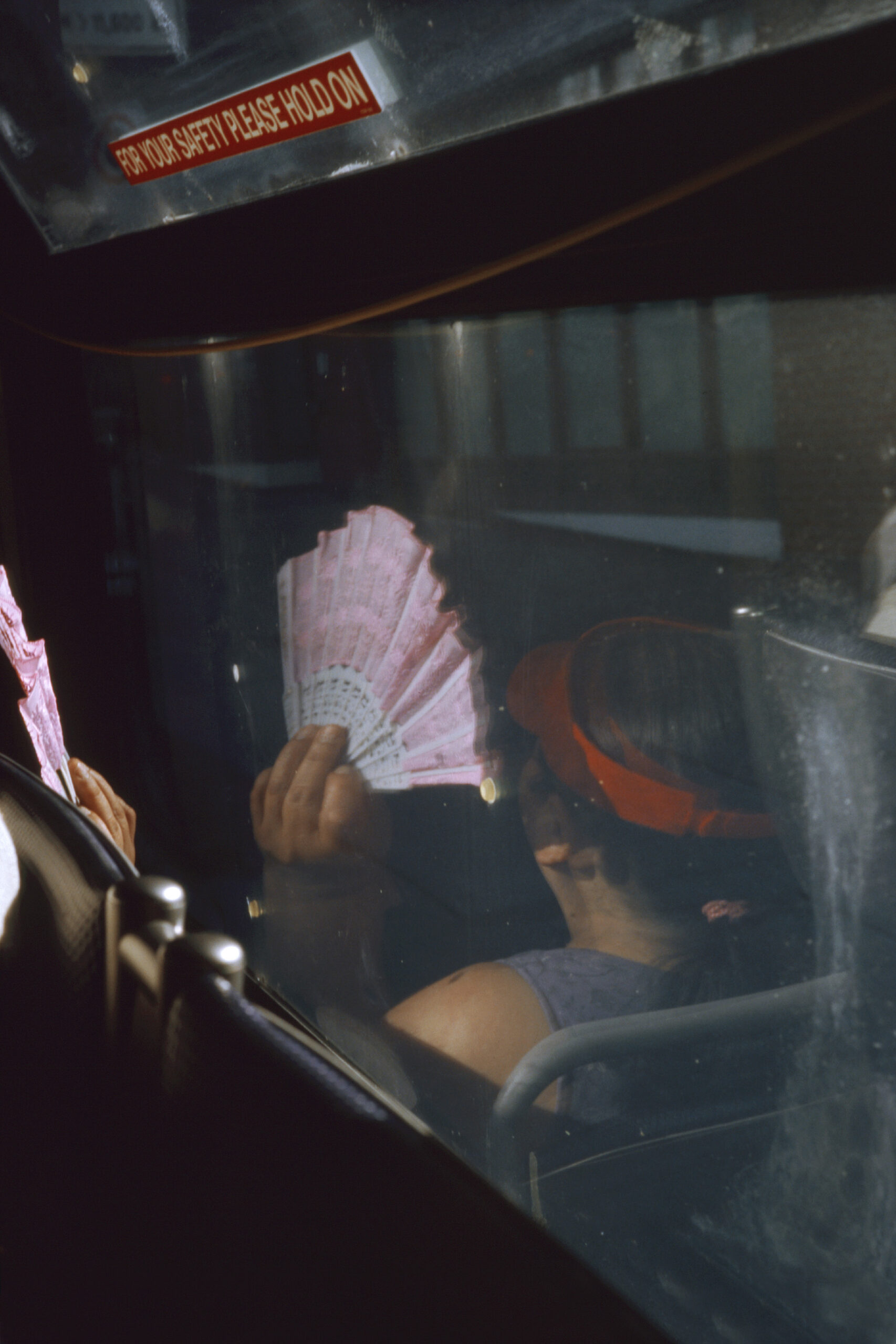 woman in bus by Marley Hutchinson